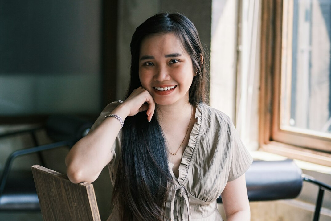 woman smiling confidently