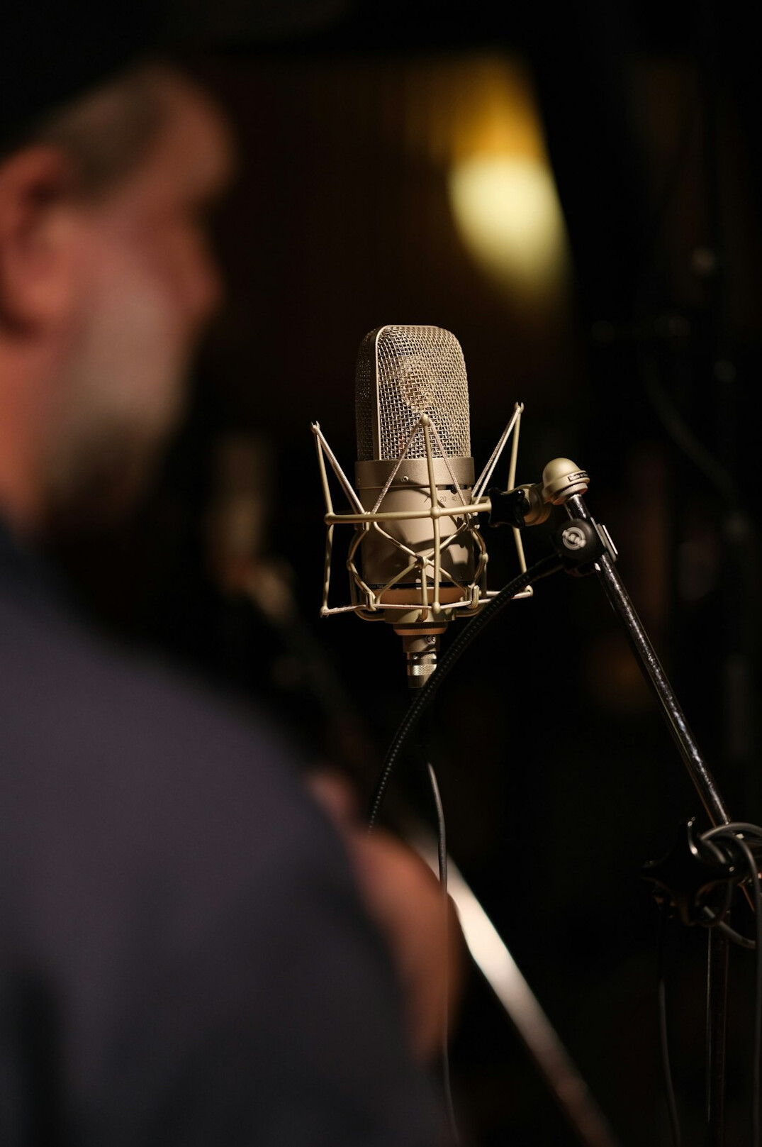 woman singing in recording studio